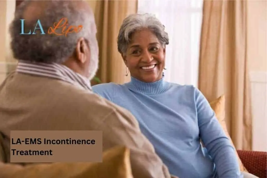 Couple sat smiling at each other - LA-EMS treatment Crewe