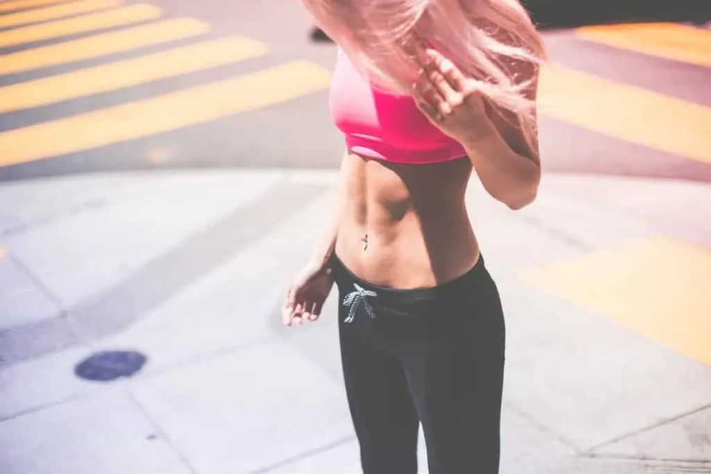 Woman with toned stomach after LA-EMS Body Sculpting Treatment Crewe